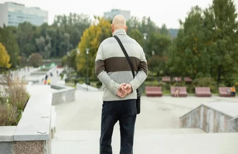 The psychology behind walking with hands behind the back