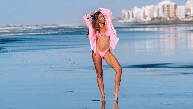 Athina Oikonomakou in pink bikini on Argentinian beach