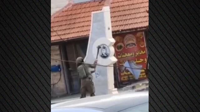Israeli Soldier Vandalizes Arafat Memorial in West Bank